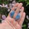 Kolczyki Widowiskowe kolczyki z niebieskim opalem