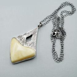 bursztynowe serce w srebrze - Wisiory - Biżuteria